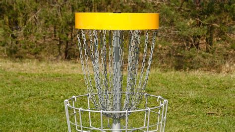 Disc Golf Basket Frisbee Golf Is Sport And Hobbie In Outdoor Park