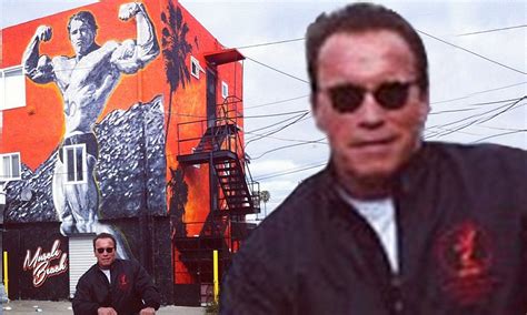 Arnold Schwarzenegger Stops For A Photo In Front Of Venice Beach Mural