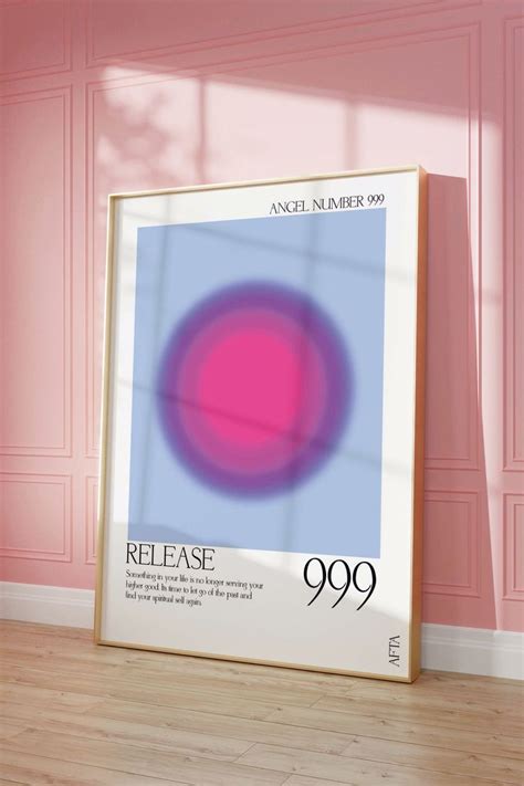 A Pink And Blue Poster With The Words Release 999 On It In Front Of A