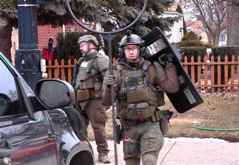 Swat Team Takes Suspect Into Custody After Multiple People Attacked