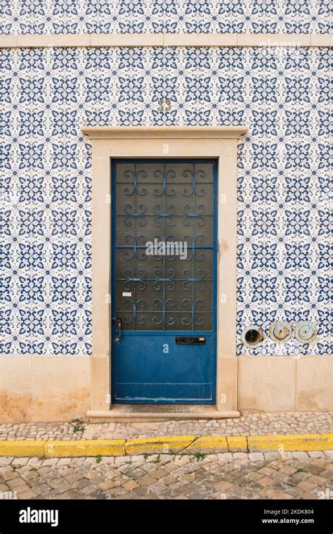 Typical Portuguese traditional design front door to property, Tavira, Algarve, Portugal Stock ...