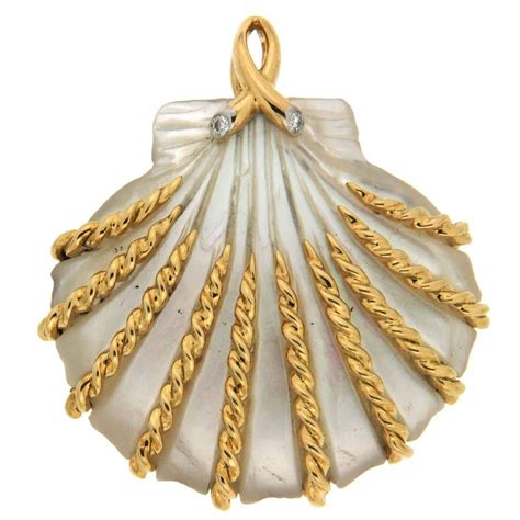 Hand Carved Mother Of Pearl Sea Shell Gold Pendant Stdibs