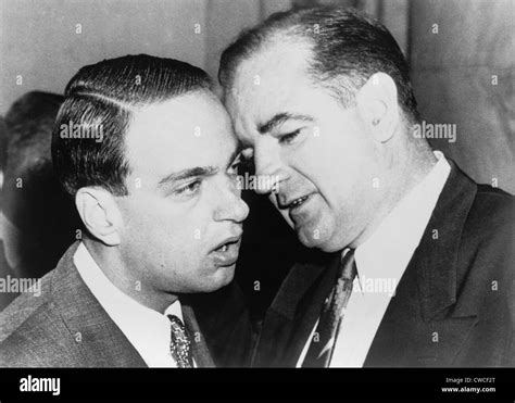 Senator Joseph McCarthy and his chief consul, Roy Cohn whispering ...