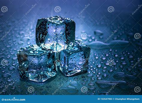 Ice Cubes and Water Melt on Cool Background. Ice Blocks with Cold ...