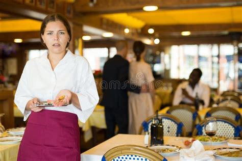 Waiter Demonstrating His Upset with Little Tips from Restaurant ...