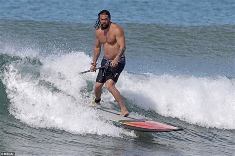 Jason Momoa Exhibits His Toned Chest As He Goes Surfing In Hawaii