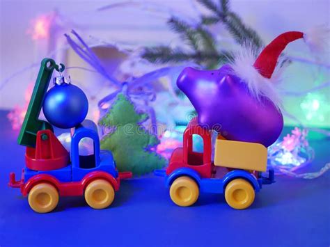 Decorative Seasonal Composition Of Toy Cars Christmas Toys Pigs In