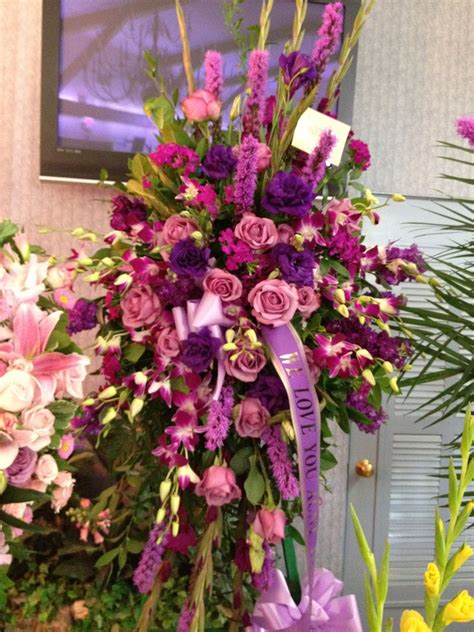 Elegant Shades Of Purples Standing Spray Sympathy Funeral Flower