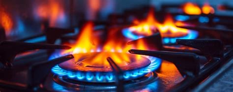 Premium Photo Close Up Of A Blue Flame On A Gas Stove