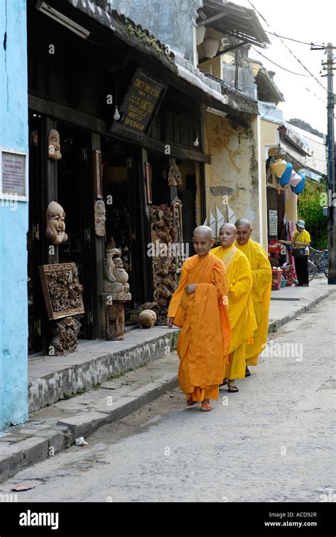 Three Female Monks In Hoi An Stock Photo Alamy