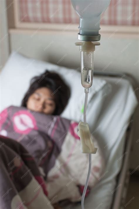 Premium Photo | Female patient resting on hospital bed
