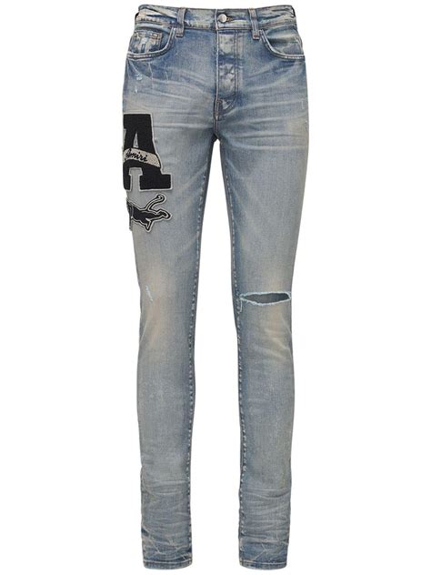 Amiri Varsity Patch Denim Jeans In Blue For Men Lyst