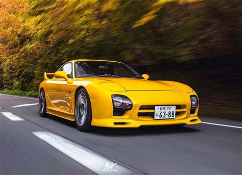 mazda rx  sunset view yellow mazda sports car yellow mazda rx  car