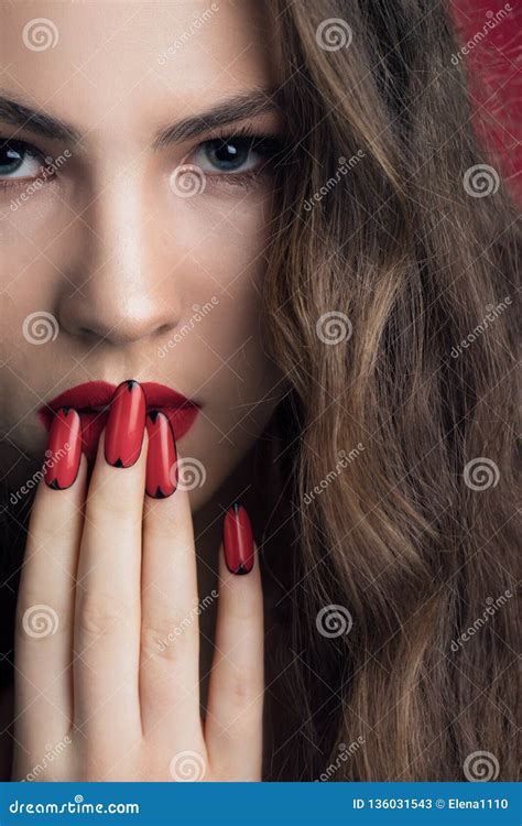 Sensual Beautiful Woman Posing In Red Dress Girl With Long Curly Hair