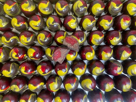 Raspberry & peanut chocolates – Sam Joseph Chocolates | Luxury