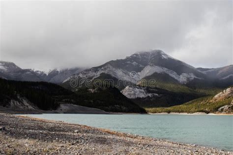 A Storm Rolls In Over Top A Mountain Lake Stock Photo Image Of River