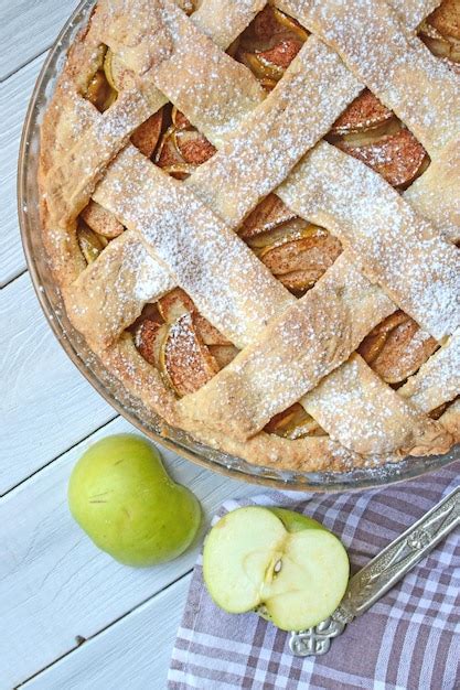 Premium Photo A Pie With A Lattice Crust And A Fresh Apple On Top