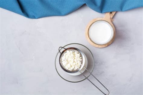 Premium Photo | Fermented fermented milk drink kefir with kefir grains.