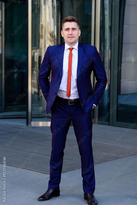 A successful businessman in a blue suit and Red tie. Stock Photo ...