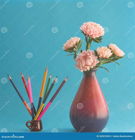 Bouquet of Pink Asters Flowers in Vase and Colored Pencils in Mug. Art
