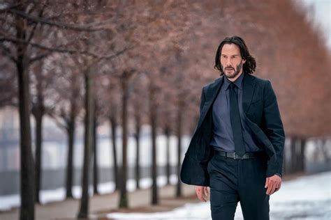 John Wick Chapter Poster Keanu Reeves Visits The Eiffel Tower