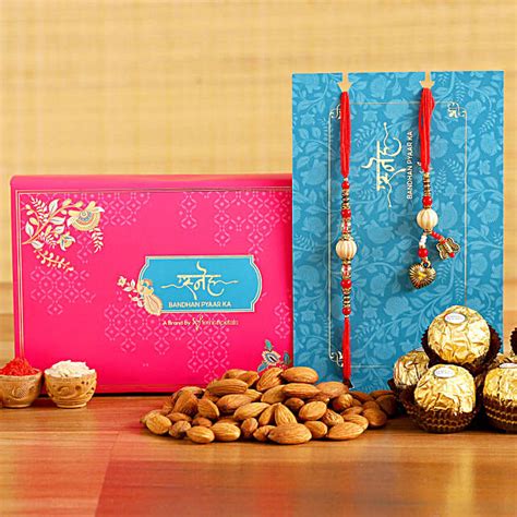 Red Pearl Lumba Rakhi Set And Kaju Katli With Ferrero Rocher Canada