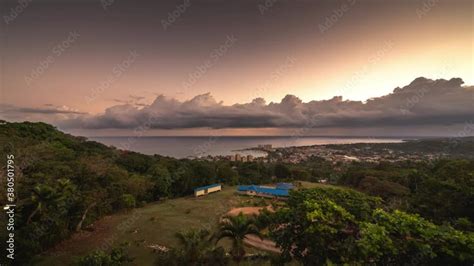 Aerial Panning Sunrise Timelapse Of Ocho Rios From A Hill With