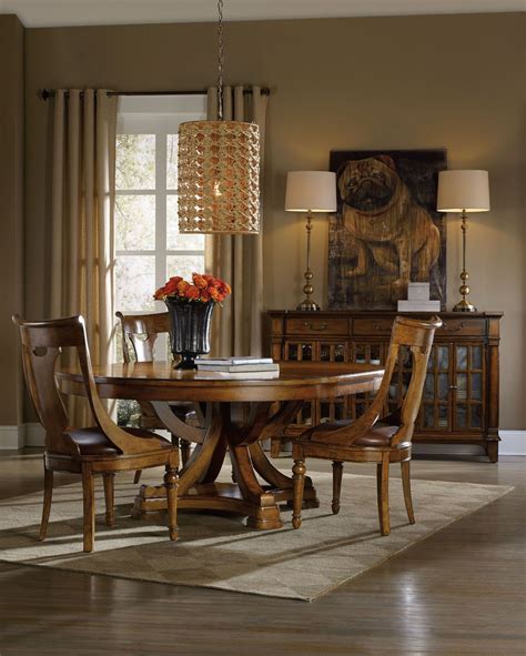 Tynecastle Brown Round Pedestal Extendable Dining Table From Hooker