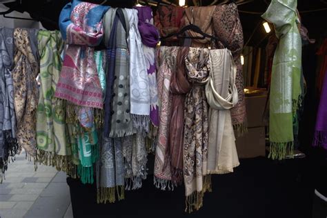 Premium Photo Scarves Hanging At Market Stall