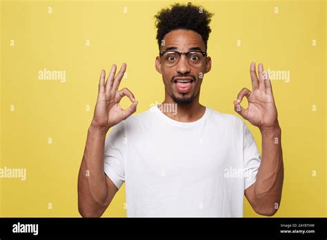 Portrait Of Happy African American Man Showing Ok Sign And Smiling