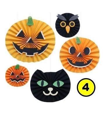 Four Paper Pumpkins With Black Cats And Faces On Them All Decorated In