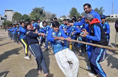 Students Are Participating In Tug Of War Competition During Dar E Arqam