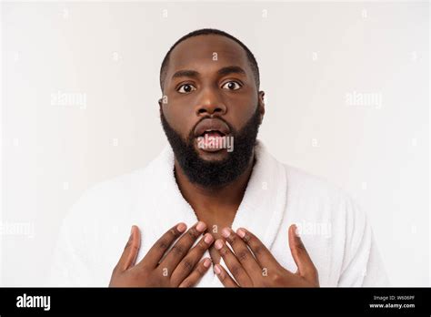 Portrait Of Excited Young African American Male Screaming In Shock And