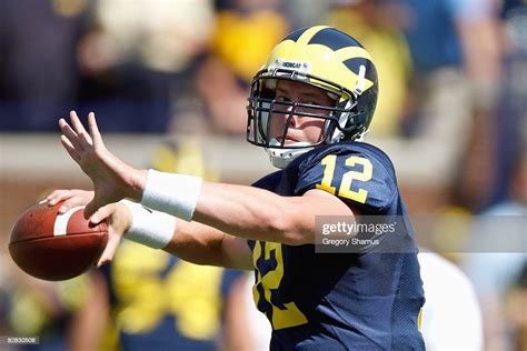 Quarterback David Cone Of The Michigan Wolverines Passes The Ball