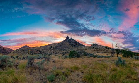 Grassland With View Of Sunset · Free Stock Photo