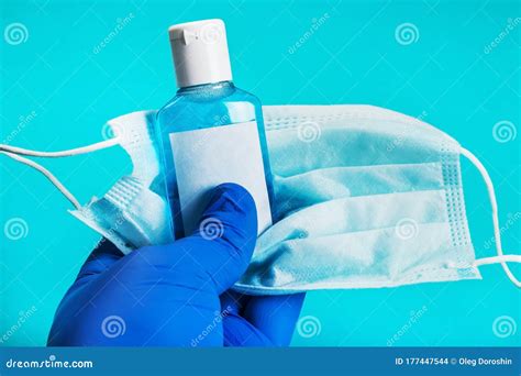 Antiseptic Hand Liquid Face Mask And Rubber Gloves Stock Photo Image