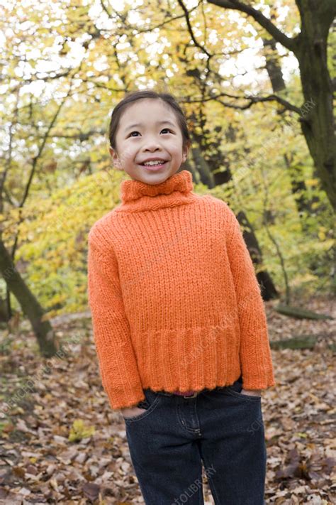 Smiling Girl In A Wood Stock Image F001 1843 Science Photo Library