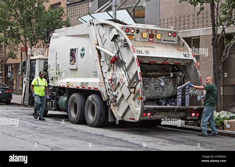 New York City Sanitation Department Employees Collecting Refuse Stock