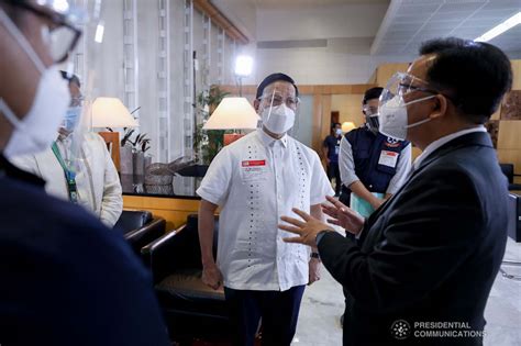 Health Secretary Francisco Duque Iii And Chinese Ambassador To The