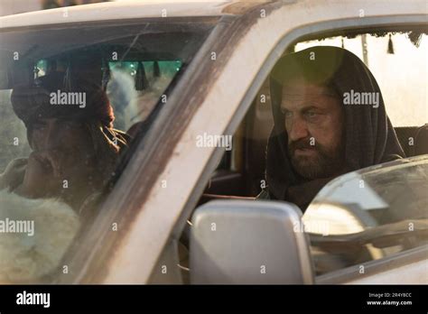 KANDAHAR From Left Navid Negahban Gerard Butler 2023 Ph Hopper