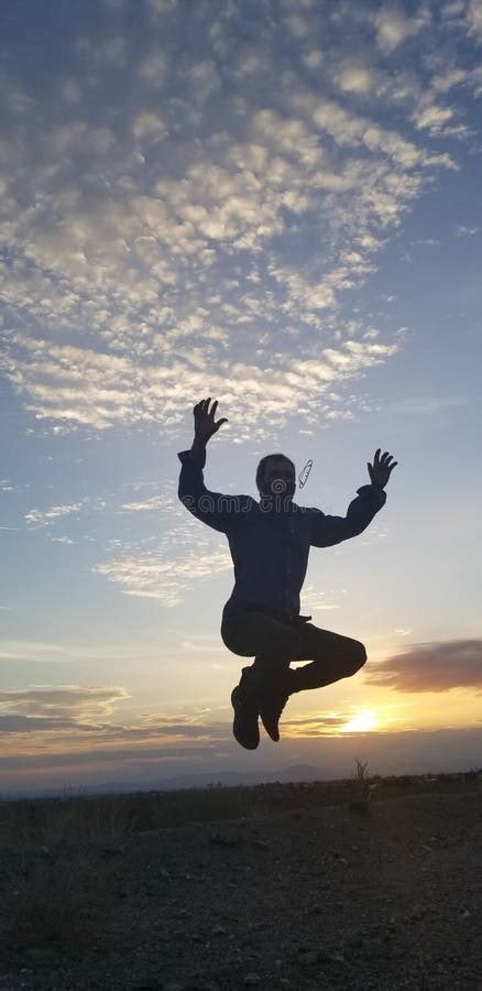 Silhouette of Jumping Male during Sunset Stock Photo - Image of ...