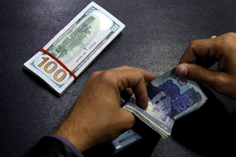 Pakistan Currency Slides In Effective Devaluation WSJ