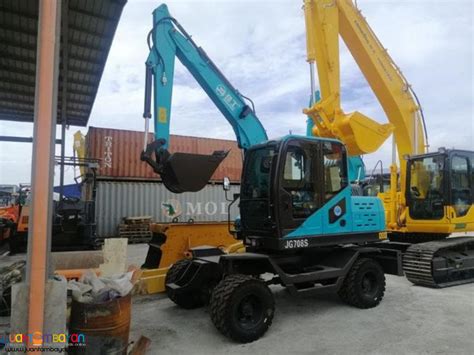 JG608S 708S JINGGONG WHEEL TYPE EXCAVATOR CHINA ENGINE 0 25 03 CBM