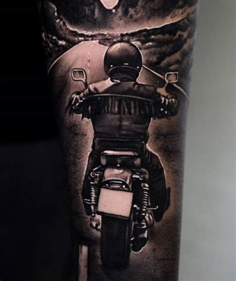 Black And Grey Biker Tattoo On The Inner Forearm