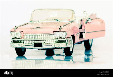 pink vintage toy car Stock Photo - Alamy