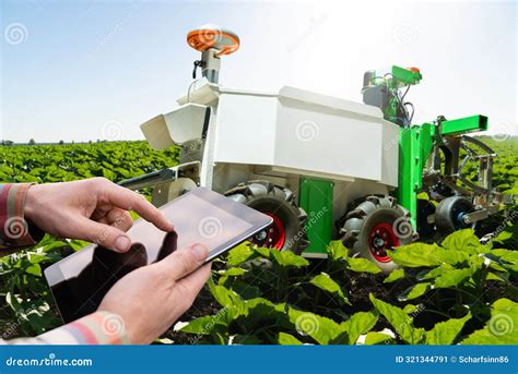 Farmer Controls Autonomous Robot in an Agricultural Field. Smart ...