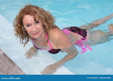 Preety Middle Aged Woman In Bikini In Pool Stock Image Image Of