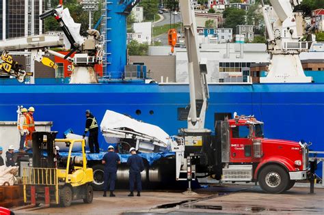 Titanic Tourist Sub Photos Show Wreckage Being Brought Ashore BBC News