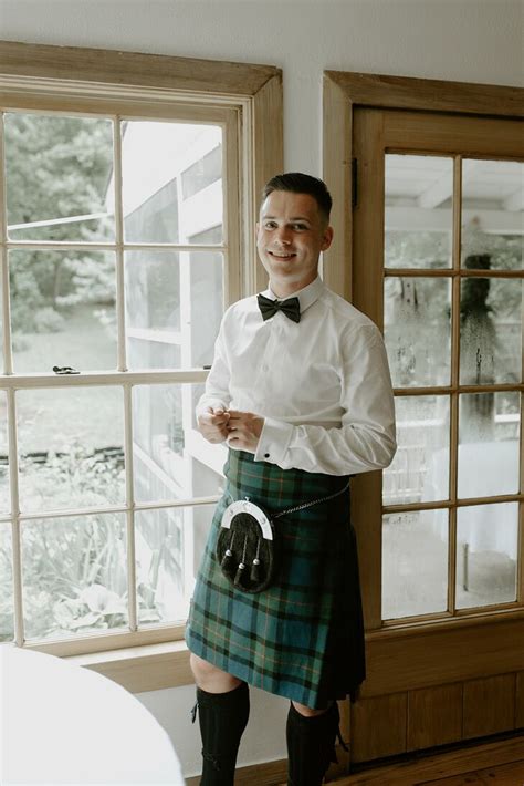 Groom Wearing Traditional Scottish Kilt