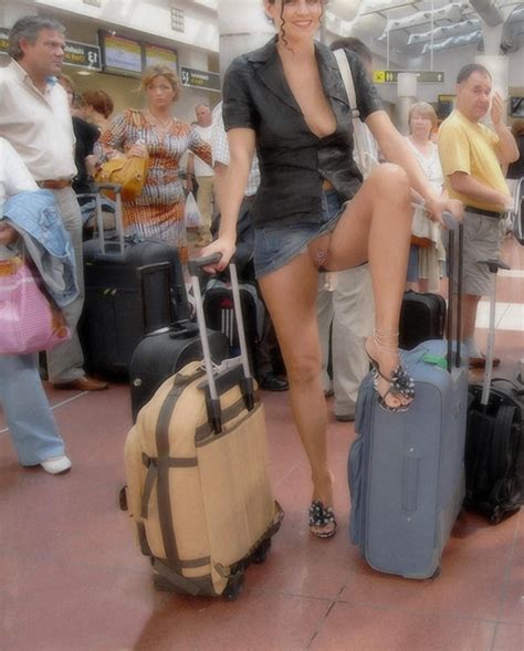 In A Short Skirt And Showing Her Pussy In A Busy Airport